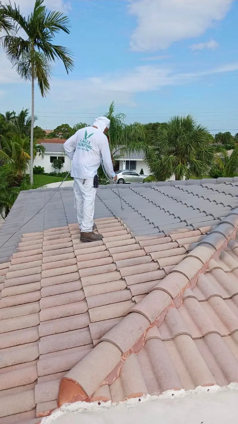 Soft washing a barrel tile roof, a service we run out of the Sunrise shop