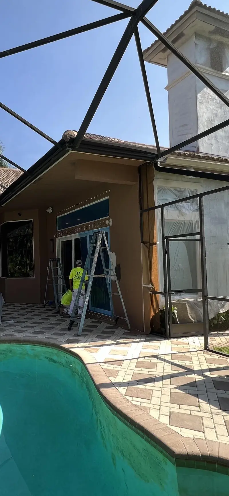 Pool screen enclosure and lanai repaint at a west Broward home